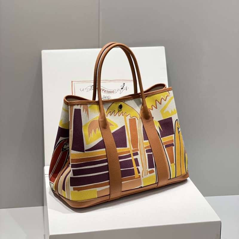 H**mes shopping bags